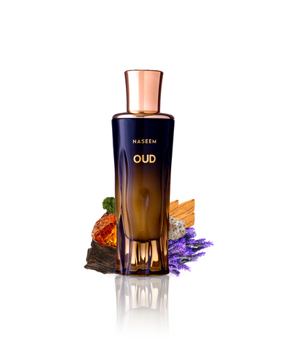 oud aqua parfum by naseem perfume bottle surrounded with ingredients like oud and amber with many more shows from behind the bottle against white background