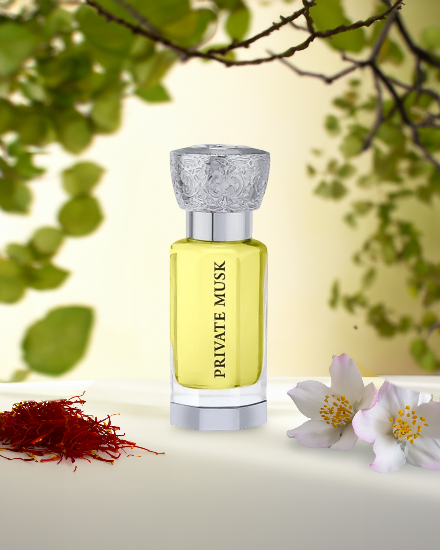 private musk by swiss arabian perfume oil bottle photograph over white surface beside white flowers and saffron on the ground with green leaves at background