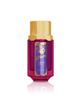 Paris corner plum liquor perfume bottle shows against white background