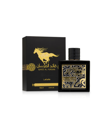 lattafa qaed al fursan black perfume bottle shows beside its box against white background