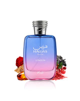 rasasi hawas london perfume bottle surrounded by fragrance notes like amber and saffron shows against white background