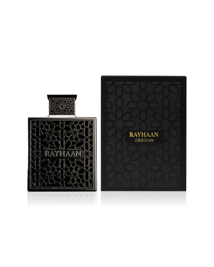 rayhaan obsidian perfume bottle shows beside its packaging against white background