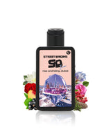 rise and bling dubai perfume bottle surrounded by fragrance notes like rose and pepper shows against white background
