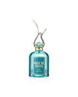 Perfume bottle labeled 'Rose de Soleil' on a white background