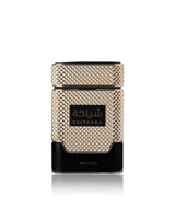 SHIYAAKA gold edp perfume bottle against white background