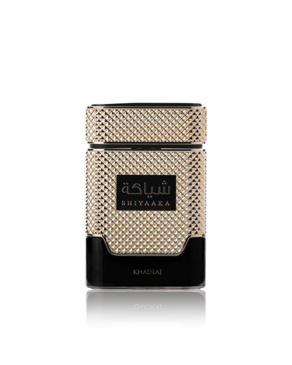 SHIYAAKA gold edp perfume bottle against white background