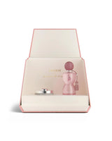 laverne sense handbag opened with sense perfume bottle shows against white background