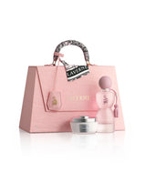 laverne sense handbag beside perfume bottle and powder pot shows against white background