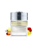 spirit of dubai bahar perfume bottle surrounded by fragrance notes like amber and citrus  shows against white background