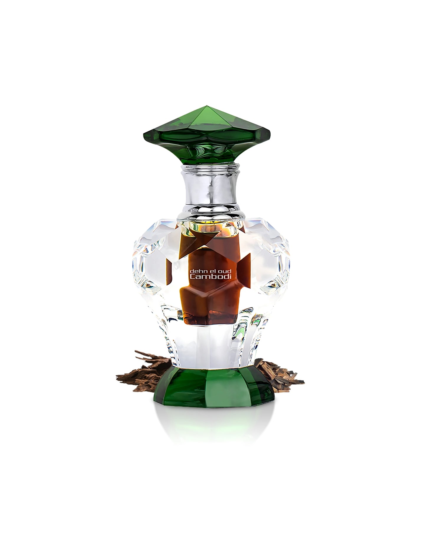 Swiss Arabian DEHN EL OUD CAMBODI Perfume oil bottle surrounded with natural oud wood shows against white background