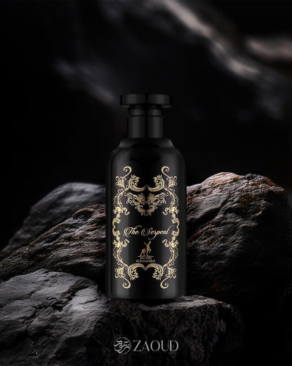 the serpent perfume bottle photograph against dark wood background