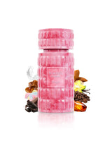 tiramisu smores perfume bottle surrounded by fragrance notes like amber and chocolate shows against white background