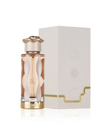 Lattafa teriaq Perfume bottle with gold accents and matching box on a white background