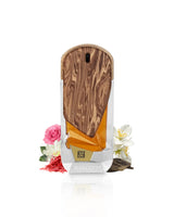 the roots 2000 perfume bottle surrounded by fragrance notes like saffron and oud shows against white background