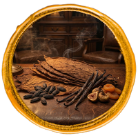 Spices and tobacco leaves on a wooden surface with a decorative gold frame.