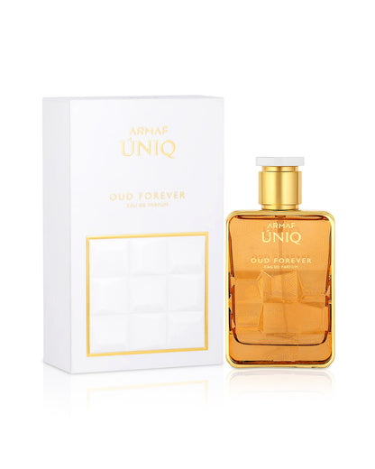 UNIQ OUD FOREVER by armaf perfume bottle shows beside its box against white background