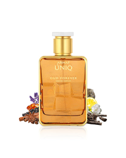 UNIQ OUD FOREVER by armaf perfume bottle surrounded with fragrance notes like spices and amber shows against white background