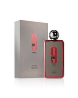 afnan 9 pm perfume bottle shows beside its box against white background