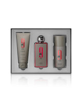 Afnan 9 pm REBEL gift set with perfume bottle beside deodorant and showergel shows inside box against white background