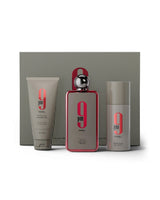 Afnan 9 pm REBEL gift set with perfume bottle beside deodorant and showergel shows outside box against white background