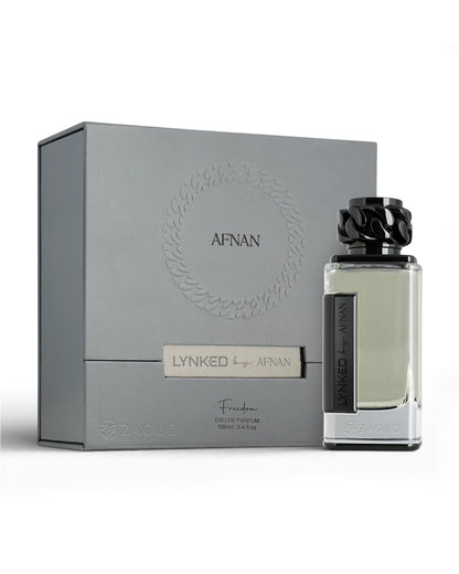 afnan lynked freedom perfume bottle shows beside its packaging against white background