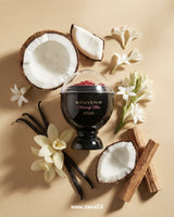 afnan-souvenir-blooming-bliss with flowers and coconuts on a beige background