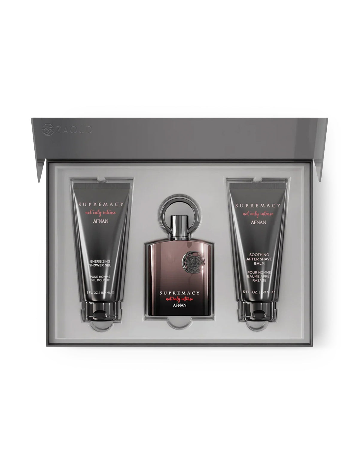 A three-piece men's grooming gift set by Afnan, featuring a central bottle of Supremacy for Men cologne and two matching body care tubes (Body Wash and Soothing After Shaver) arranged inside an open gray presentation box.