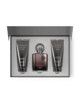 A three-piece men's grooming gift set by Afnan, featuring a central bottle of Supremacy for Men cologne and two matching body care tubes (Body Wash and Soothing After Shaver) arranged inside an open gray presentation box.