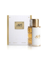 ahmed al maghribi perfume bottle beside box shows against white background