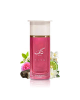 ahmed al maghribi kaaf pink perfume bottle surrounded by fragrance notes like lime and peony shows against white background