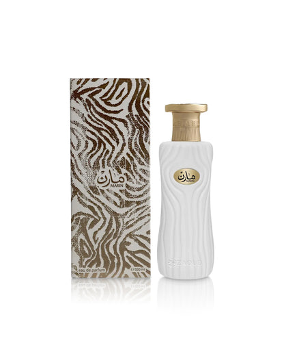 ahmed al maghribi marin perfume bottle shows beside its packaging against white background