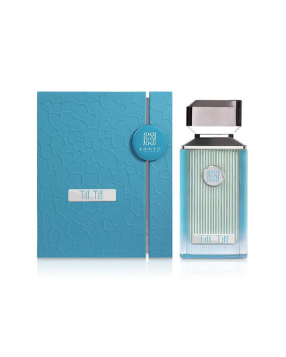 ahmed al maghribi tiff tiff perfume bottle shows beside its packaging against white background