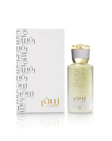 ahmed al maghribi zuraique perfume bottle shows beside its packaging against white background