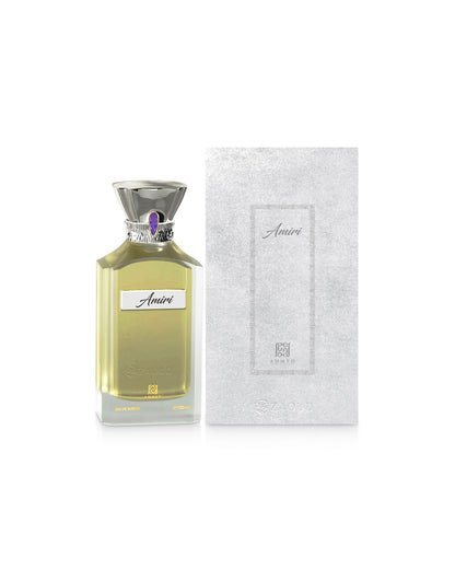 ahmed al maghribi amiri perfume bottle shows beside its packaging against white background