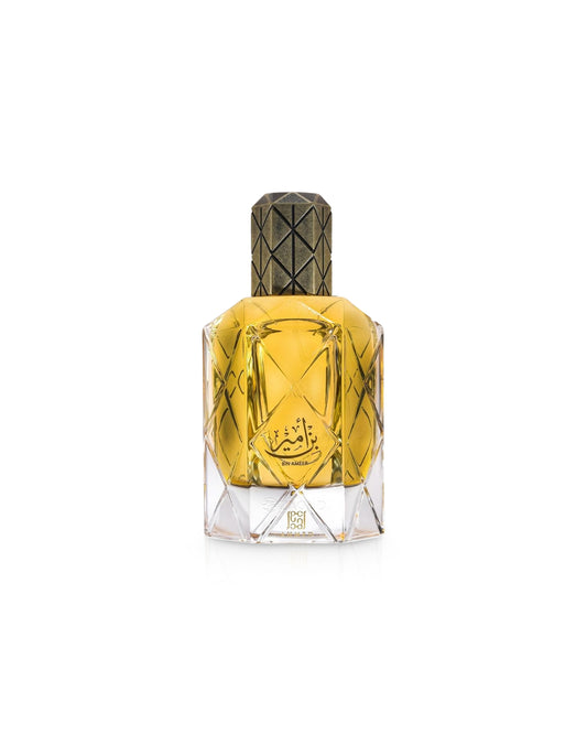 ahmed al maghribi bin ameer Perfume bottle with gold cap and geometric design on a white background