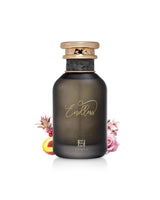 ahmed al maghribi endless perfume bottle surrounded with fragrance notes like peach and rose shows against white background