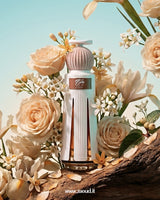 Ahmed Al Maghribi Marj perfume bottle surrounded by luxurious floral and woody elements, representing a rich oriental fragrance with oud, amber, and leather notes.