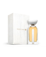 ahmed al maghribi white tiger perfume bottle shows beside its packaging against white background