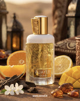 Perfume bottle labeled 'AJAYEB DUBAI' with fruits and flowers on a wooden surface.