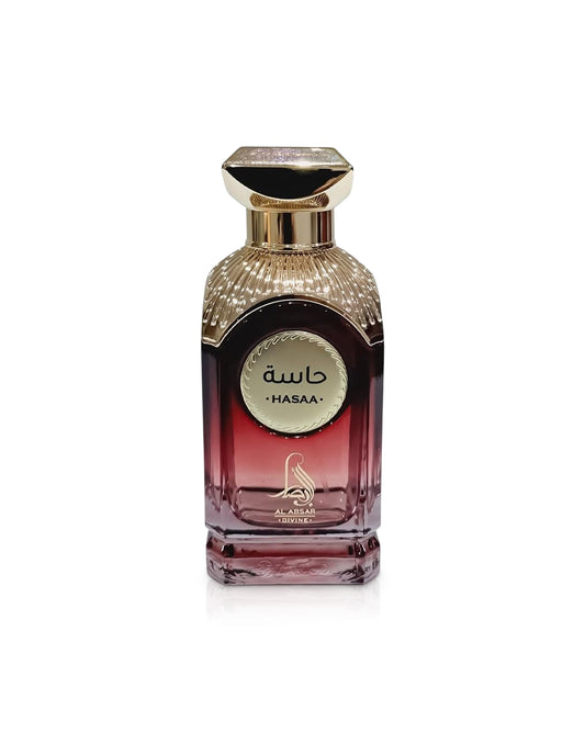 al absar hasaa Perfume bottle with gold cap and red base on a white background