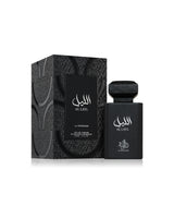 AL WATANIAH Black perfume bottle and packaging with 'Al Layl' branding on a white background