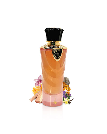 al wataniah tibyan perfume bottle surrounded with its ingredients like sandalwood and amber shows from behind the bottle  against white background