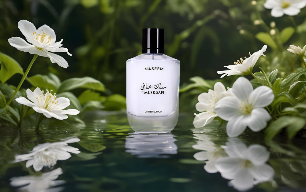 alcohol-free aqua perfume bottle from naseem musk safi surounded white flowers.