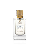alhambra flower addiction perfume bottle against white background