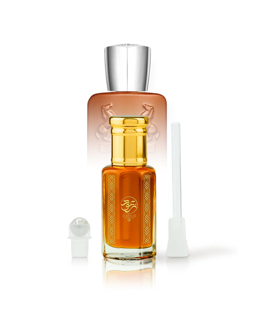 altanur perfume oil bottle beside roller and stick with althair perfume bottle behind against white background