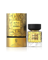 nylaa amber al zaeem perfume bottle shows beside its box against white background
