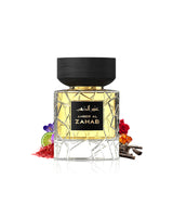 NYLAA Perfume bottle labeled 'Amber Al Zahab' with decorative elements LIKE SAFFRON and rose on a white background