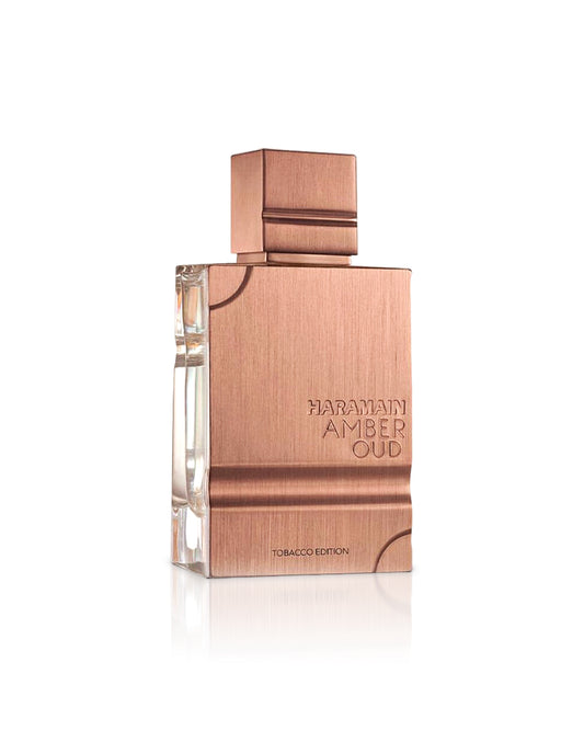 amber oud tobacco edition by al haramain perfume bottle shows against white background