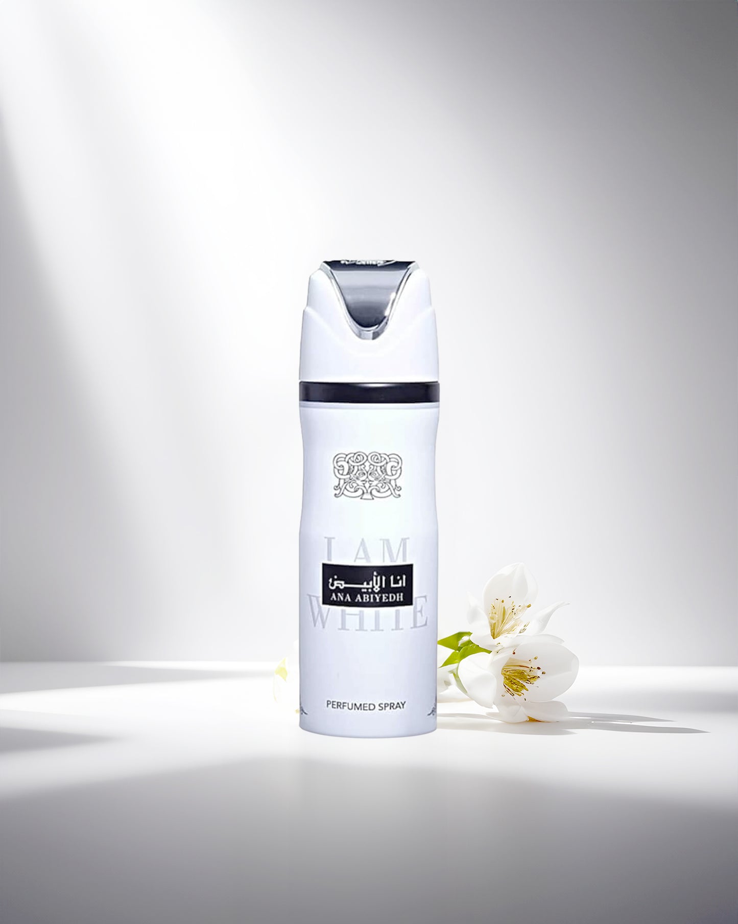 ana abiyedh deodorant bottle photograph over white surface beside a white flower.