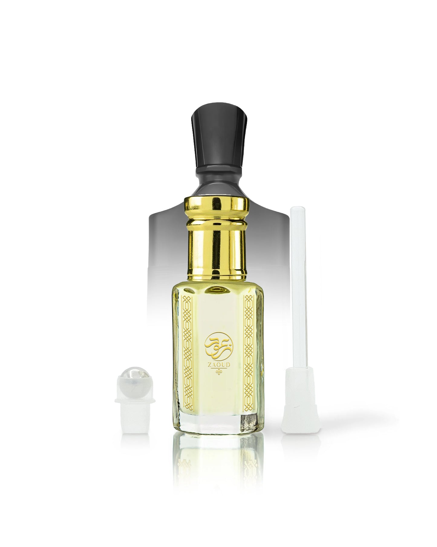 ananas absolu perfume oil bottle with pale yellow liquid, a shiny gold neck, a black cap, and a gold logo on the front. A small white spray atomizer and a white applicator tube are placed beside it on a clean white background.